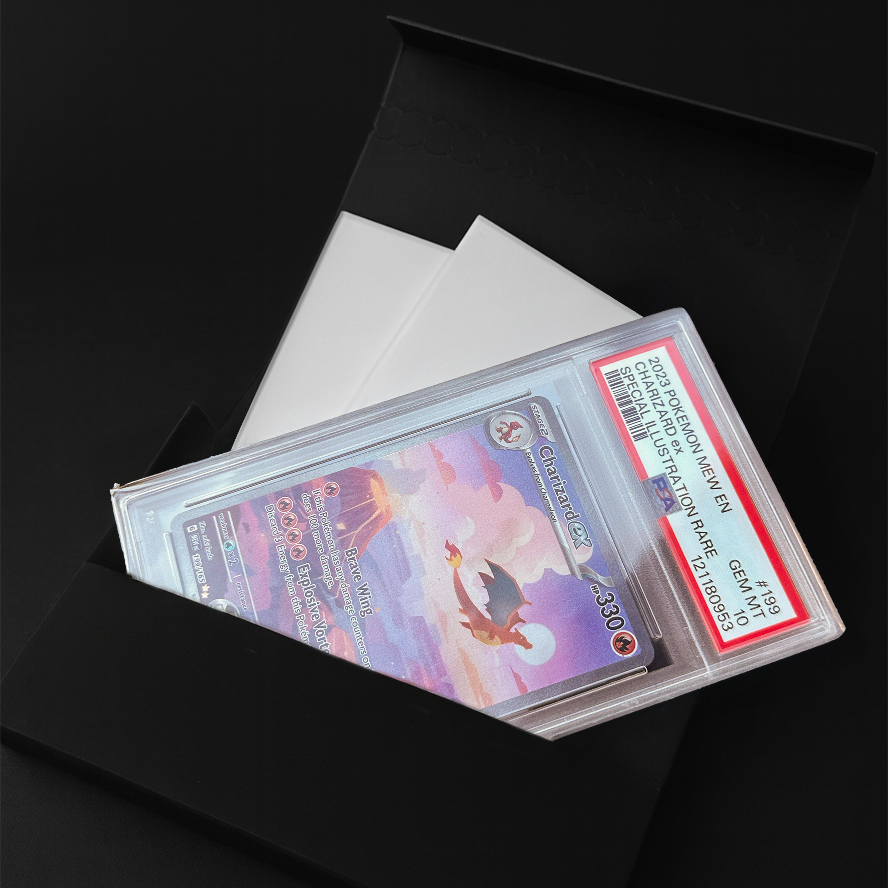 PSA graded Pokemon Trading card inside a Graded Slab PullShield shipping sleeve with protective foamboard inserts on a black background.