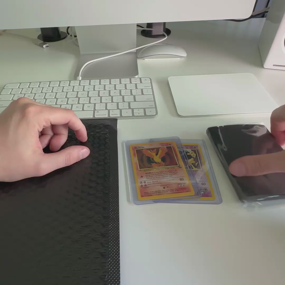 Video demonstration showing two Pokémon cards in top loaders being securely packaged inside a PullShield sleeve for fast, safe, and hassle-free shipping.